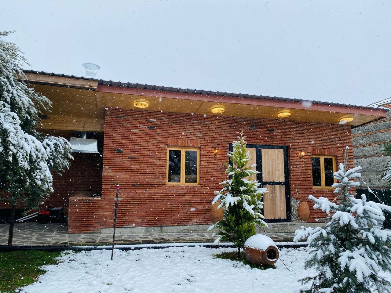 Lagwine brick winery building in winter snow